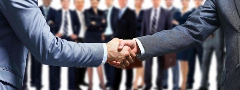 real estate business partnership handshake