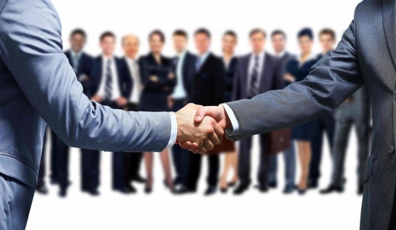 real estate business partnership handshake
