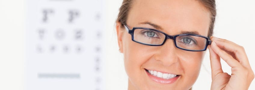 woman eye doctor glasses office