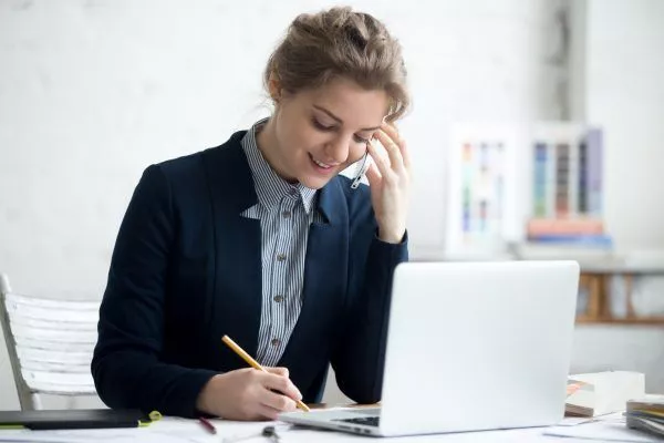 woman at desk does IT asset management