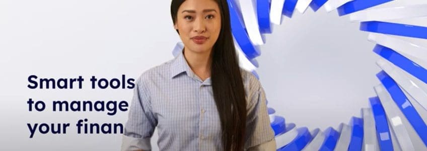 business woman stands in front of a presentation background